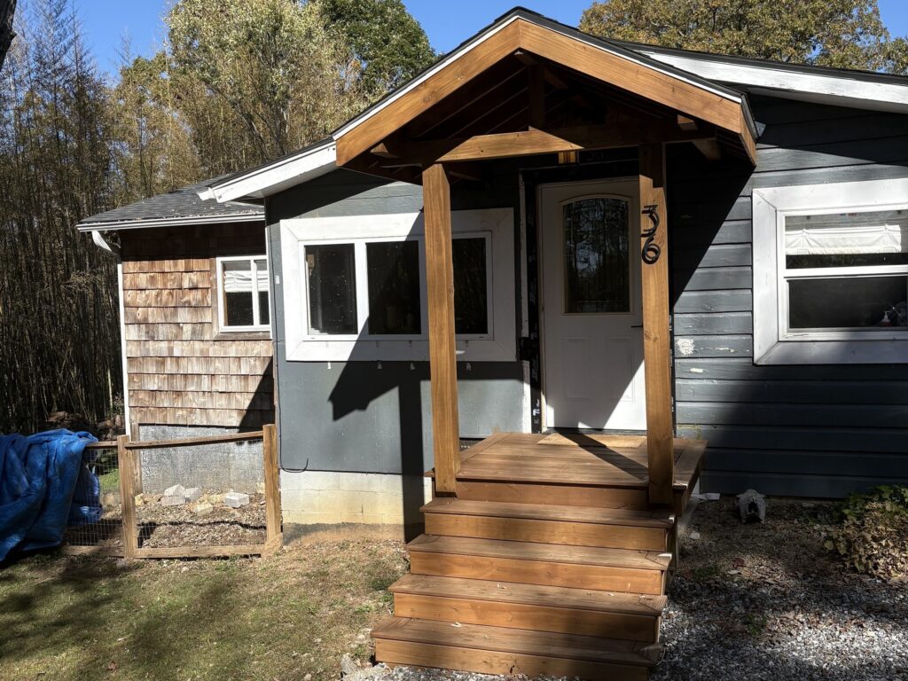 wood front stoop to house